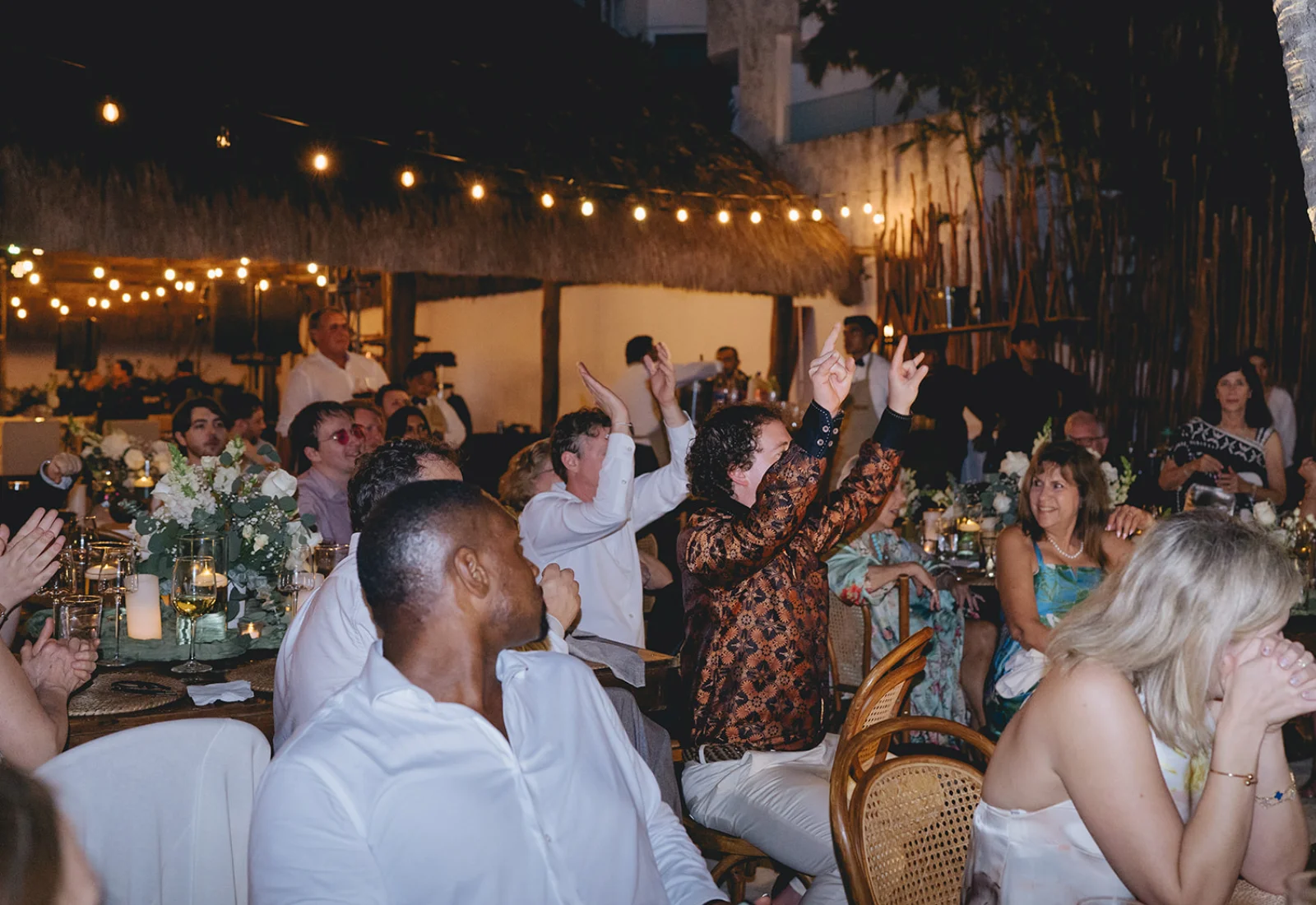 Beachfront dinner celebration at night