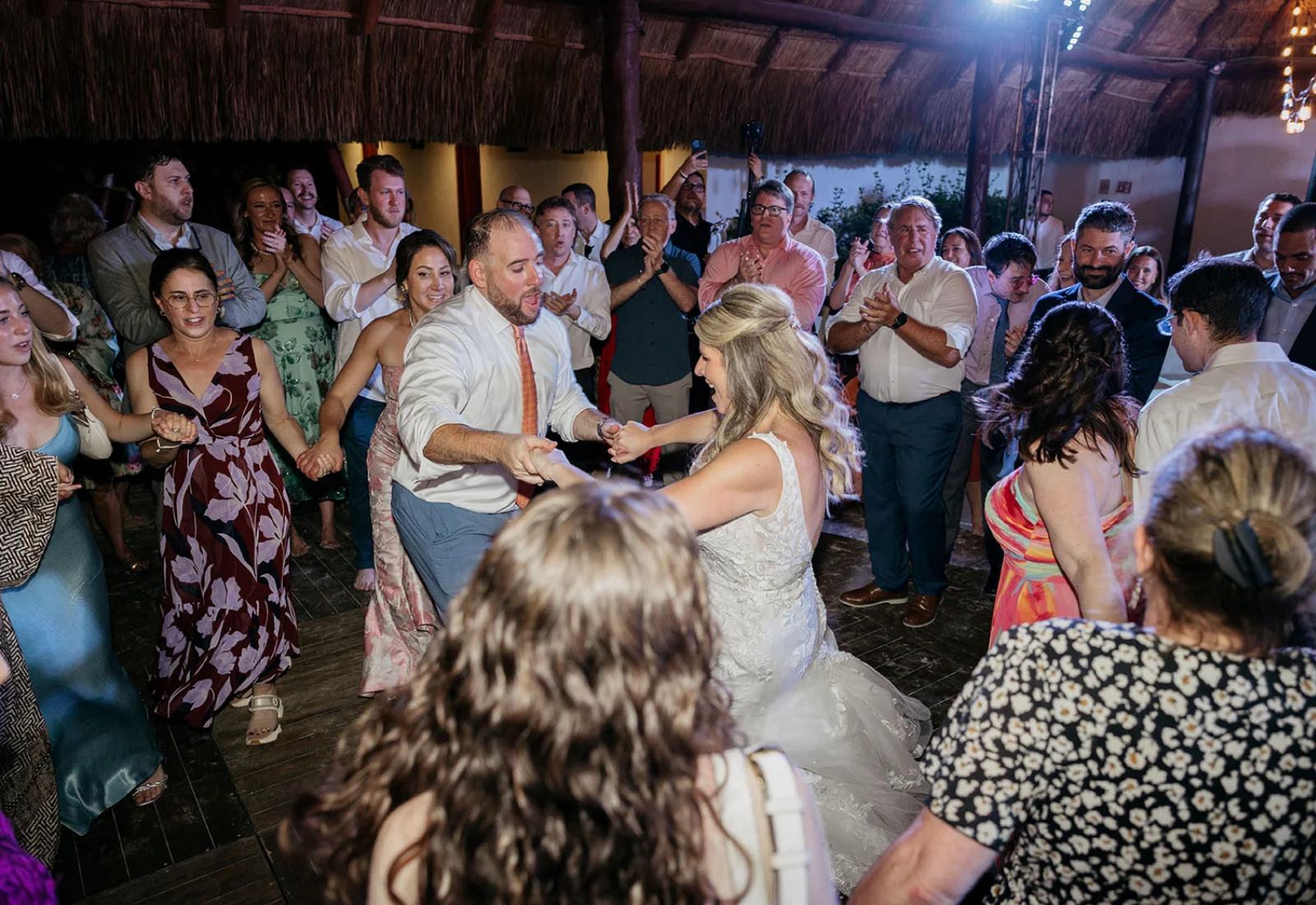 All-inclusive wedding reception under string lights